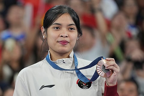 Badminton Women's singles: Indonesia's Gregoria Mariska Tunjung celebrates after wining the bronze medal